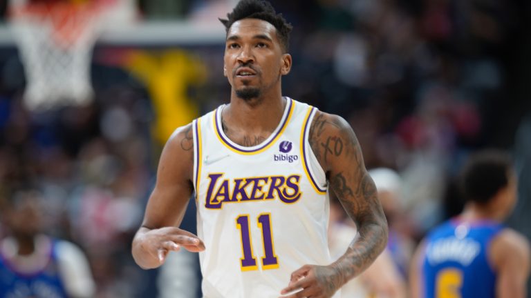 Los Angeles Lakers Malik Monk gestures after hitting a 3-point-basket against the Denver Nuggets in the second half of an NBA basketball game Sunday, April 10, 2022, in Denver. (David Zalubowski/AP)