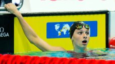Summer McIntosh, 15, wins world swimming gold on huge day for Canada