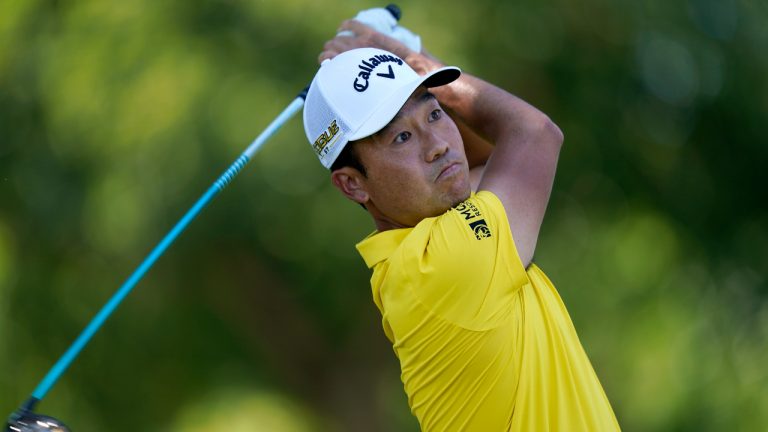 Kevin Na hits watches his tee shot off the third hole during the second round of the Charles Schwab Challenge golf tournament at the Colonial Country Club, Friday, May 27, 2022, in Fort Worth, Texas. (LM Otero/AP)