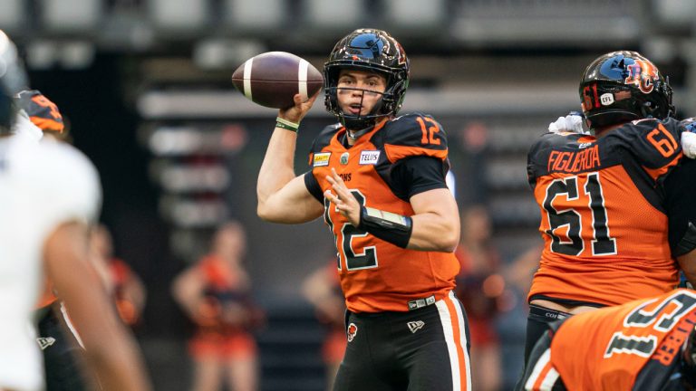 BC Lions quarterback Nathan Rourke throws a pass during first half of CFL football action against the Toronto Argonauts in Vancouver. (Rich Lam/CP)