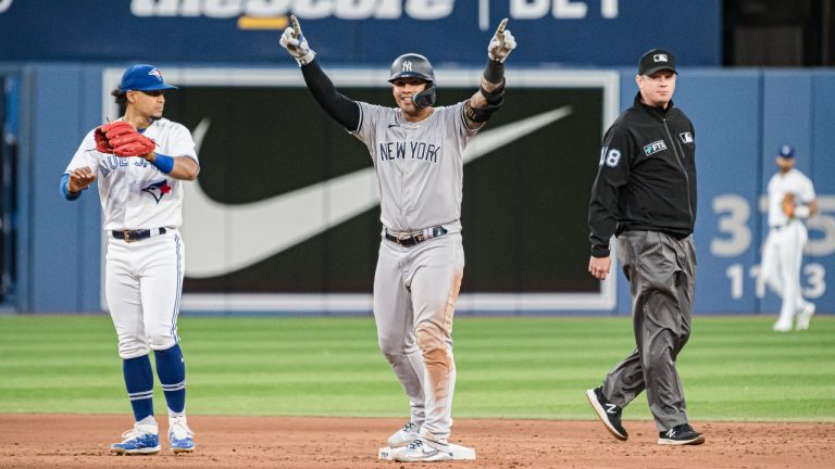 New York Yankees second baseman Gleyber Torres (25) celebrates after hitting a double during fifth inning MLB baseball action against the Toronto Blue Jays, in Toronto on Friday, June 17, 2022. (Christopher Katsarov/CP)