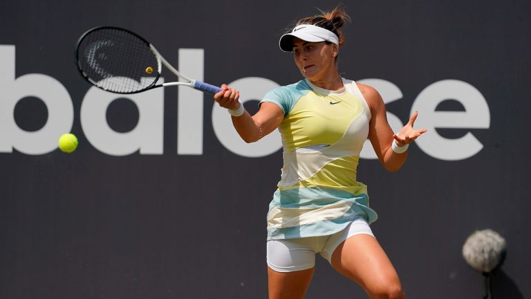 Canada's Bianca Andreescu in action against Russia's Daria Kasatkina during their WTA Tour Women's Singles Quarterfinals in Bad Homburg, Germany, Thursday June 23, 2022. (Hasan Bratic/dpa via AP)