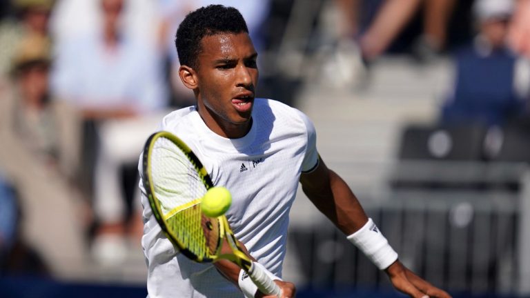 Canada's Felix Auger Aliassime during his ATP EXHO singles match against Novak Djokovic on day two of the Giorgio Armani Tennis Classic at the Hurlingham tennis club, England, Wednesday June 22, 2022. (John Walton/PA via AP)