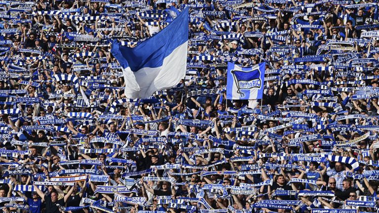 Hertha fans during the Bundesliga soccer match between Hertha BSC and FSV Mainz at Olympiastadion, Berlin, Saturday May 7, 2022. (Soeren Stache/dpa via AP)