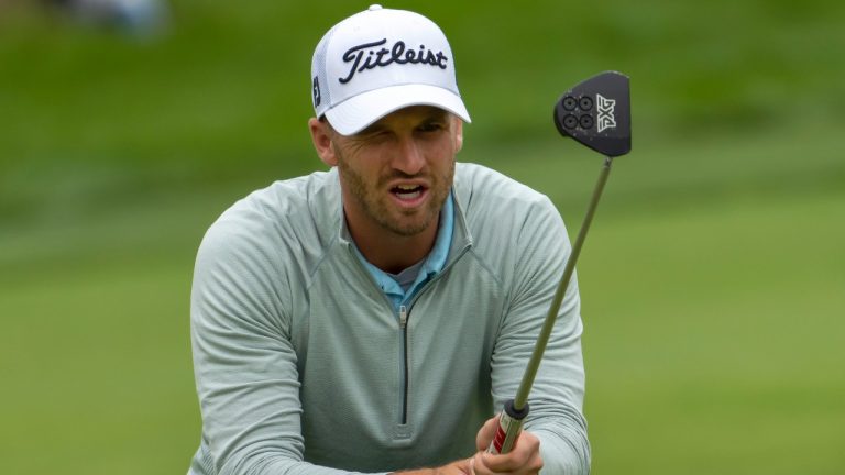 Wyndham Clark of the USA lines up his putt on the 8th green during the first round of the Canadian Open in Toronto on Thursday, June 9, 2022. (Frank Gunn/CP)