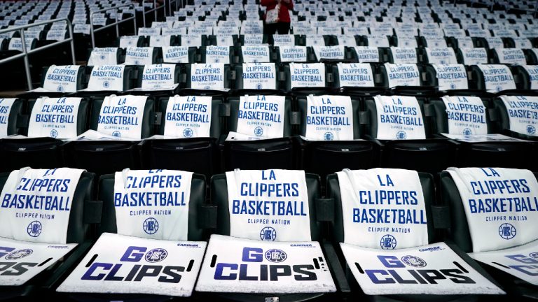 A fan is seen in the stands prior to an NBA basketball play-in tournament game between the Los Angeles Clippers and the New Orleans Pelicans Friday, April 15, 2022, in Los Angeles. (Mark J. Terrill/AP)