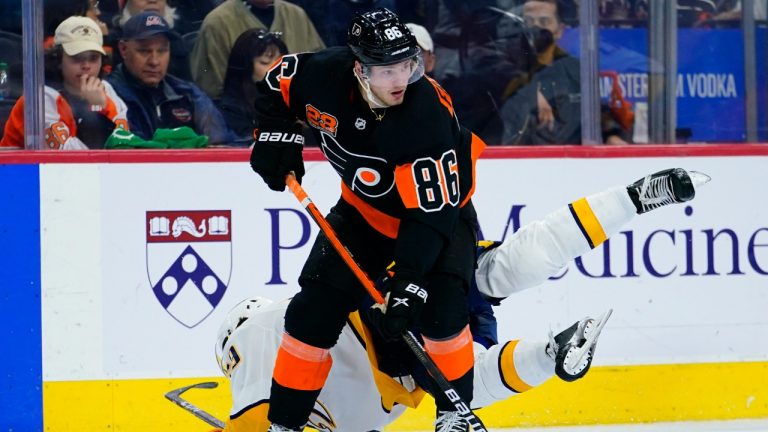 Nashville Predators' Roman Josi, lets, and Philadelphia Flyers' Joel Farabee collide during the second period of an NHL hockey game, Thursday, March 17, 2022, in Philadelphia. (Matt Slocum/AP)