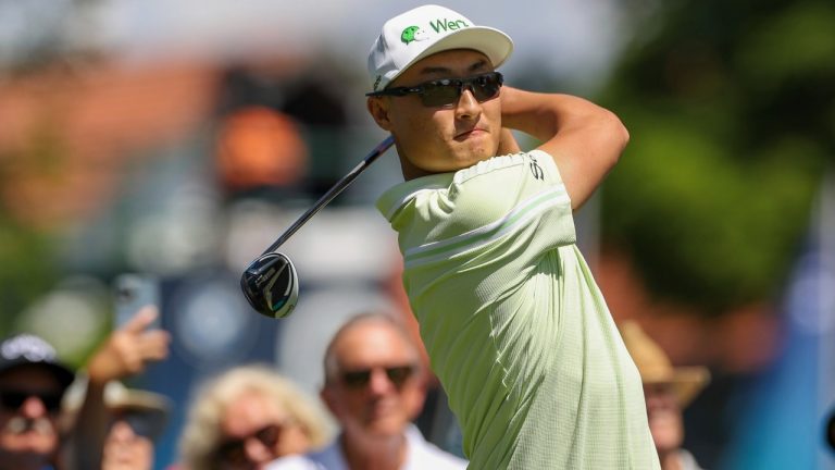 China's Li Haotong tees off during the German International Open golf tournament at Golfclub Muenchen Eichenried in Munich, Germany, Thursday, June 23, 2022. (Christian Kolbert/dpa via AP)