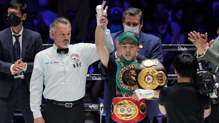 Japan's Naoya Inoue celebrates after defeating Philippines' Nonito Donaire in the bantamweight title unification boxing match of WBA, WBC and IBF in Saitama, north of Tokyo, Tuesday, June 7, 2022. (Hiro Komae/AP)