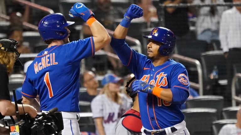 New York Mets' Jeff McNeil and Eduardo Escobar celebrate after they scored on Escobar's two-run home run during the sixth inning of the team's baseball game against the Washington Nationals, Tuesday, May 31, 2022, in New York. (Mary Altaffer/AP)