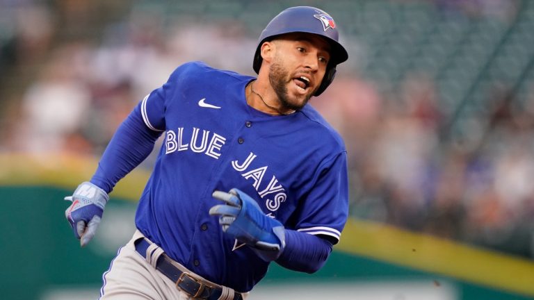 Toronto Blue Jays' George Springer heads home to score during the first inning of a baseball game against the Detroit Tigers, Friday, June 10, 2022, in Detroit. (Carlos Osorio/AP)