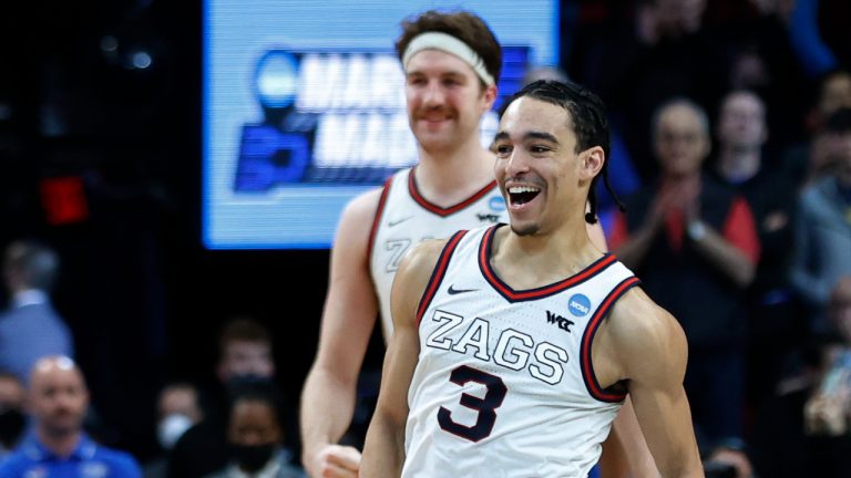 Gonzaga guard Andrew Nembhard (3) celebrates with forward Drew Timme, left, at the end of a second-round NCAA college basketball tournament game against Memphis, Saturday, March 19, 2022, in Portland, Ore. Gonzaga won 82-78. (Craig Mitchelldyer/AP)