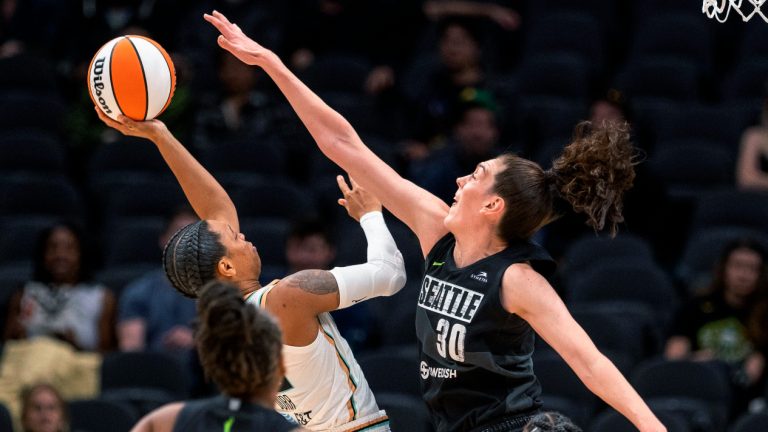 Seattle Storm's Breanna Stewart rises up to defend against a shot by New York Liberty's AD Durr during the first half of a WNBA basketball game Friday, May 27, 2022, in Seattle. (Dean Rutz/AP)