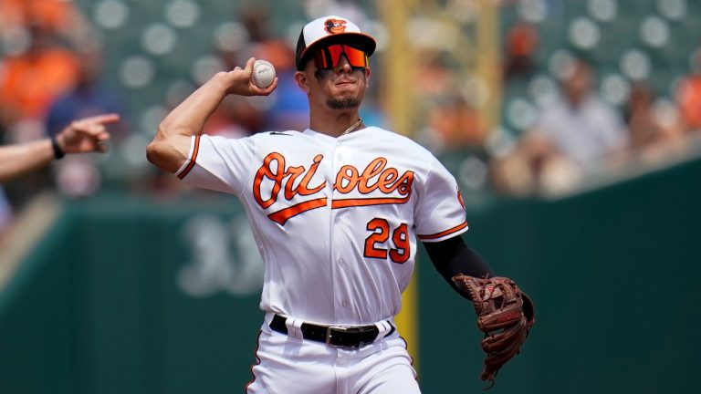 Baltimore Orioles third baseman Ramon Urias throws out Los Angeles Angels' Max Stassi at first base on a groundout during the second inning of a baseball game, Sunday, July 10, 2022, in Baltimore. (Julio Cortez/AP)