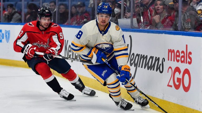 Buffalo Sabres defenceman Jacob Bryson, right, has signed a new two-year contract. (Adrian Kraus/AP)
