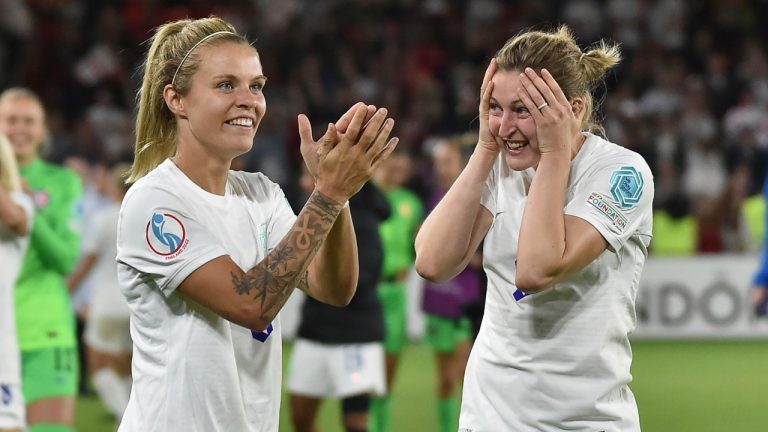 England's Leah Williamson, left, and Ellen White celebrate as they won the Women Euro 2022 semi final soccer match between England and Sweden at the Bramall Lane Stadium in Sheffield, England, Tuesday, July 26, 2022. (Rui Vieira/AP Photo)