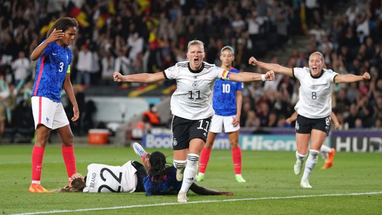 Germany's Alexandra Popp celebrates scoring her side's second goal during the Women Euro 2022 semifinal soccer match between Germany and France at Stadium MK in Milton Keynes, England, Wednesday, July 27, 2022. (Nick Potts/AP)
