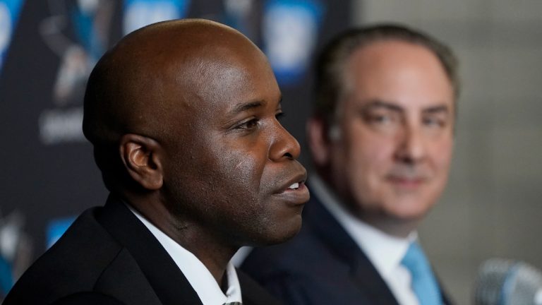 Mike Grier speaks to reporters as he is introduced as the new general manager of the San Jose Sharks. (Jeff Chiu/AP)