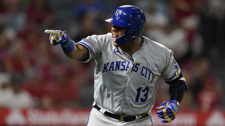 Kansas City Royals' Salvador Perez (13) points to the dugout after hitting a home run during the eighth inning of a baseball game against the Los Angeles Angels in Anaheim, Calif., Monday, June 20, 2022. Andrew Benintendi also scored. (Ashley Landis/AP)