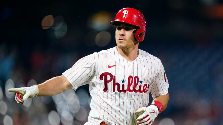 Philadelphia Phillies' J.T. Realmuto reacts after hitting a two-run home run against Washington Nationals pitcher Erasmo Ramirez during the fifth inning of a baseball game, Tuesday, July 5, 2022, in Philadelphia. (Matt Slocum/AP Photo)