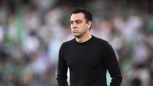 Former Barcelona's head coach Xavi Hernandez reacts during the Spanish La Liga soccer match between Real Betis and Barcelona at Benito Villamarin stadium in Seville, Spain, Saturday, May 7, 2022. Xavi has missed his team's flight for a preseason tour of the United States because of problems with his passport, the Spanish club said Saturday, July 16, 2022. (Jose Breton/AP, File)