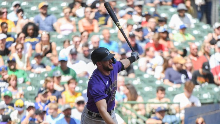 Colorado Rockies Kris Bryant hits a double during the third inning of a baseball game against the Milwaukee Brewers, Sunday, July 24, 2022, in Milwaukee. (Kenny Yoo/AP)