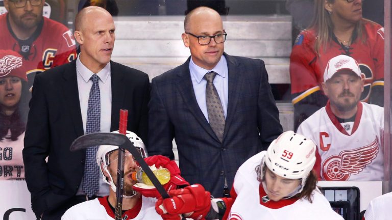 Doug Houda, left, seen here on the bench with Jeff Blashill and the Detroit Red Wings, has been hired by the New York Islanders as an assistant coach. (Larry MacDougall/CP)