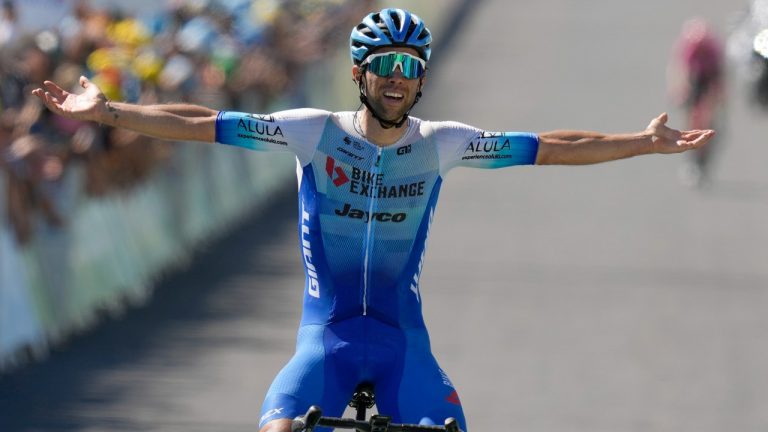 Stage winner Australia's Michael Matthews celebrates as he crosses the finish line of the fourteenth stage of the Tour de France cycling race over 192.5 kilometers (119.6 miles) with start in Saint-Etienne and finish in Mende, France, Saturday, July 16, 2022. (Thibault Camus/AP)