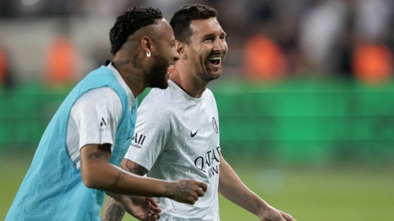 PSG's Neymar, left, smiles with his teammate Lionel Messi prior to the start of the French Super Cup final soccer match between Nantes and Paris Saint-Germain at Bloomfield Stadium in Tel Aviv, Israel, Sunday, July 31, 2022. (Ariel Schalit/AP)