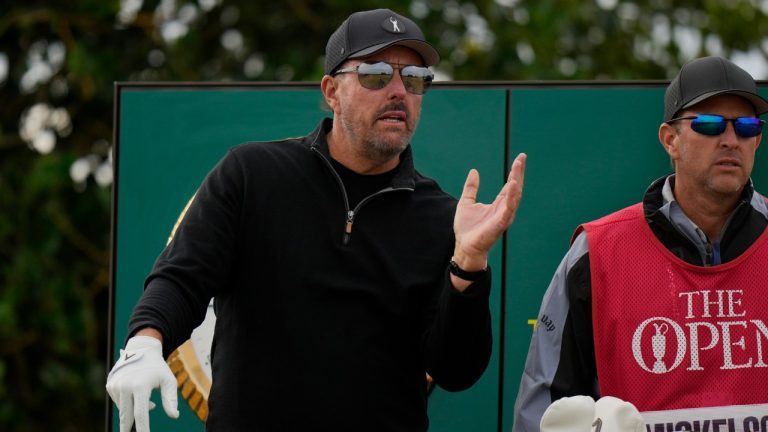 Phil Mickelson of the US prepares to play from the 3rd tee during the first round of the British Open golf championship on the Old Course at St. Andrews, Scotland, Thursday, July 14 2022. The Open Championship returns to the home of golf on July 14-17, 2022, to celebrate the 150th edition of the sport's oldest championship, which dates to 1860 and was first played at St. Andrews in 1873. (Alastair Grant/AP)