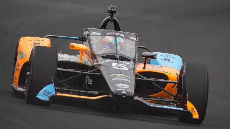 Pato O'Ward, of Mexico, drives through the first turn during qualifications for the Indianapolis 500 auto race at Indianapolis Motor Speedway in Indianapolis, Saturday, May 21, 2022. (Michael Conroy/AP)
