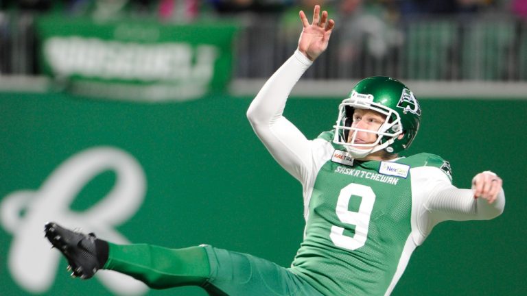 Saskatchewan Roughriders punter Jon Ryan follows through on a punt during second half CFL action against the Winnipeg Blue Bombers, in Regina on Saturday, Oct. 5, 2019. (Mark Taylor/CP)
