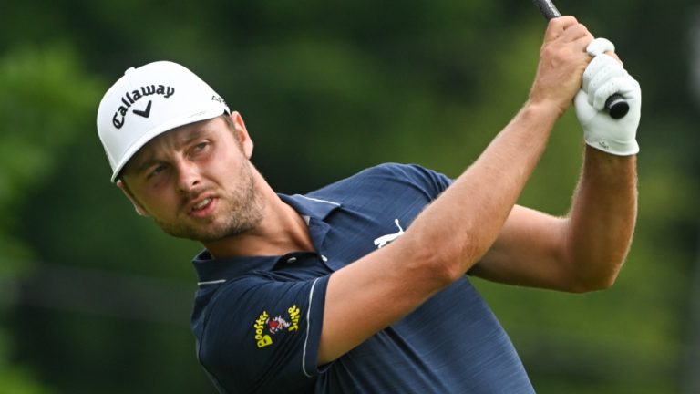 Adam Svensson hits on the fifth hole during the second round of the Barbasol Championship golf tournament, Friday July 8, 2022, in Nicholasville, Kentucky. (John Amis/AP)