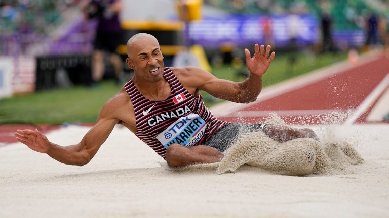 Damian Warner, of Canada, competes in the decathlon long jump at the World Athletics Championships on Saturday, July 23, 2022, in Eugene, Ore. (David J. Phillip/AP)