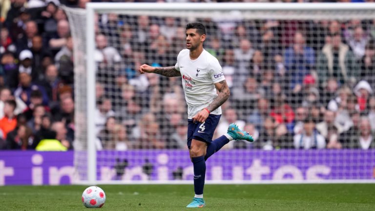 Tottenham's Cristian Romero runs with the ball during the English Premier League soccer match between Tottenham Hotspur and Leicester City at Tottenham Hotspur stadium in London. (Matt Dunham/AP)