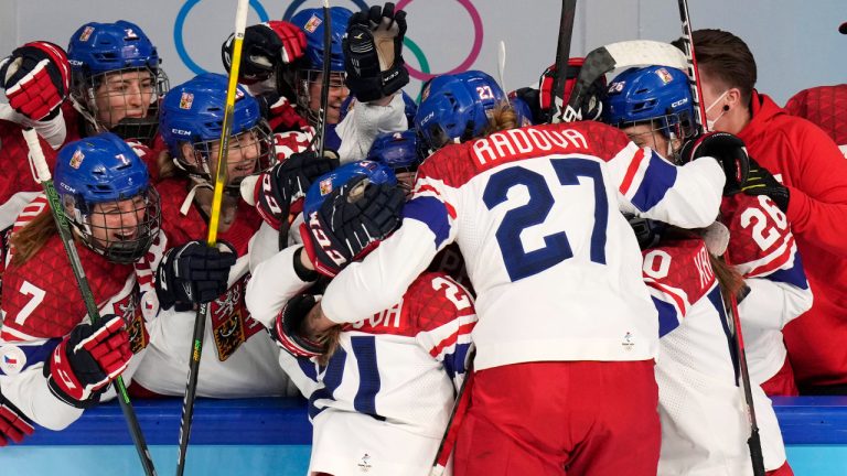 Czech Republic's Michaela Pejzlova (18) celebrates her goal with teammates during a women's quarterfinal hockey game against United States at the 2022 Winter Olympics, Friday, Feb. 11, 2022, in Beijing. (Petr David Josek/AP)