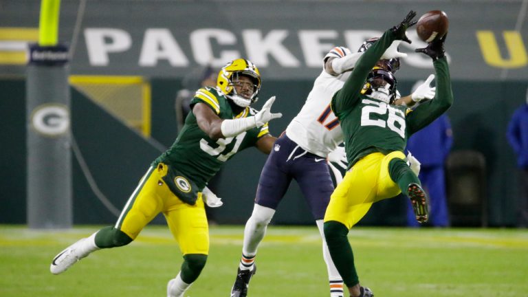 Green Bay Packers' Darnell Savage intercepts a pass in front of Chicago Bears' Anthony Miller during the second half of an NFL football game Sunday, Nov. 29, 2020, in Green Bay, Wis. (Mike Roemer/AP)