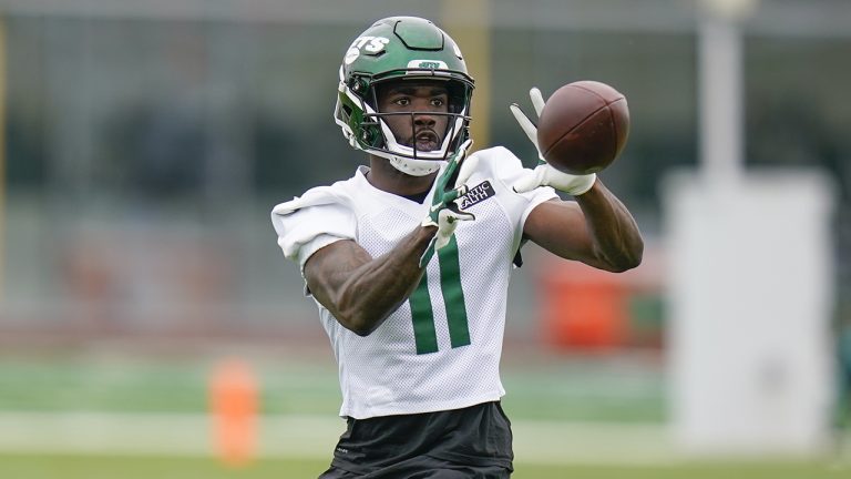 FILE -New York Jets' Denzel Mims participates in a drill at the NFL football team's training facility in Florham Park, N.J., Tuesday, May 24, 2022. Denzel Mims was the New York Jets' exciting new playmaker two summers ago, a potential game-changing wide receiver for years to come. A lot has happened since. And not a lot good.(Seth Wenig, File/AP)