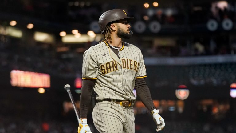 San Diego Padres' Fernando Tatis Jr. walks to the dugout after striking out against the San Francisco Giants during the first inning of a baseball game. (Jeff Chiu/AP)