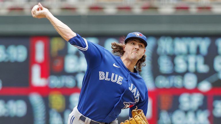 Toronto Blue Jays starting pitcher Kevin Gausman throws to a Minnesota Twins batter in the first inning of a baseball game Sunday, Aug. 7, 2022, in Minneapolis. (Bruce Kluckhohn/AP)