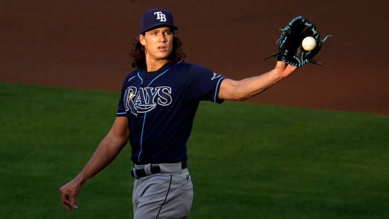 Tampa Bay Rays starting pitcher Tyler Glasnow throws a live batting practice as he returns from Tommy John surgery prior to a baseball game against the Los Angeles Angels, Tuesday, Aug. 23, 2022, in St. Petersburg, Fla. (Mike Carlson/AP)