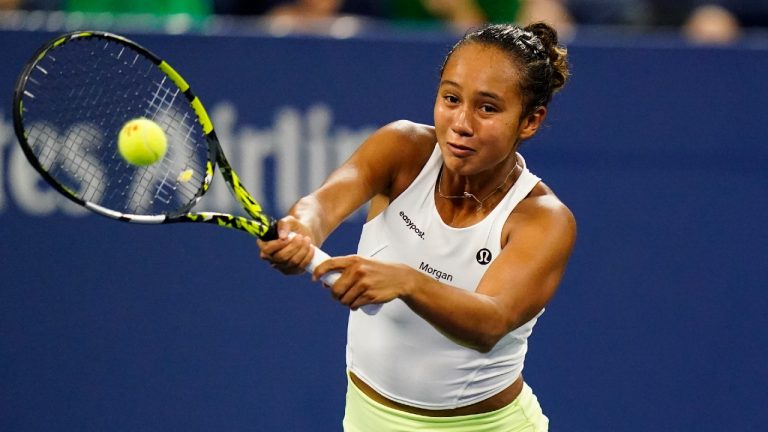 Leylah Fernandez, of Canada, returns a shot to Oceane Dodin, of France, during the first round of the US Open tennis championships, Monday, Aug. 29, 2022, in New York. (Frank Franklin II/AP)