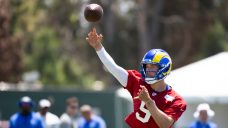 Stafford downplays elbow injury, throws in Rams practice