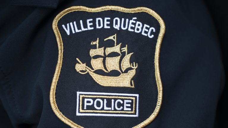 A Quebec City police badge is seen in Quebec City, Friday, Dec. 3, 2021. (Jacques Boissinot/CP)