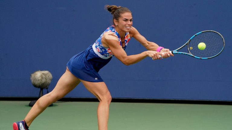Valentini Grammatikopoulou returns a shot to Elise Mertens, of Belgium, during the second round of the US Open tennis championships, Wednesday, Sept. 1, 2021, in New York. (John Minchillo/AP)