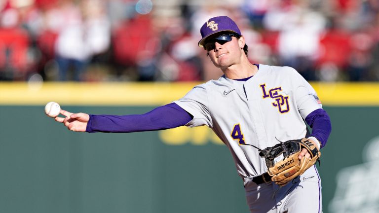 Cade Doughty #4 of the LSU Tigers warms up before a game against the Arkansas Razorbacks at Baum-Walker Stadium at George Cole Field on April 14, 2022 in Fayetteville, Arkansas.(Photo by Wesley Hitt/Getty Images)