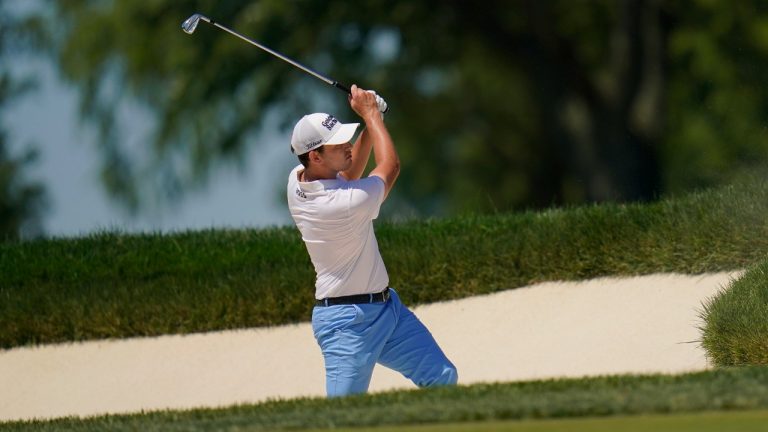 Patrick Cantlay plays a shot from a bunker on the fifth hole during the third round of the BMW Championship golf tournament at Wilmington Country Club, Saturday, Aug. 20, 2022, in Wilmington, Del. (Julio Cortez/AP)