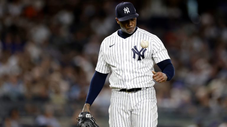 New York Yankees pitcher Aroldis Chapman reacts while he waits to be taken out during the ninth inning of a baseball game against the Toronto Blue Jays, Friday, Aug. 19, 2022, in New York. (Adam Hunger/AP)