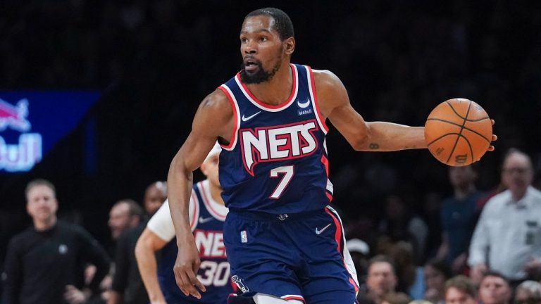 Brooklyn Nets forward Kevin Durant (7) dribbles down court during the second half of an NBA basketball game against the Cleveland Cavaliers Friday April 8, 2022, in New York. (Bebeto Matthews/AP)