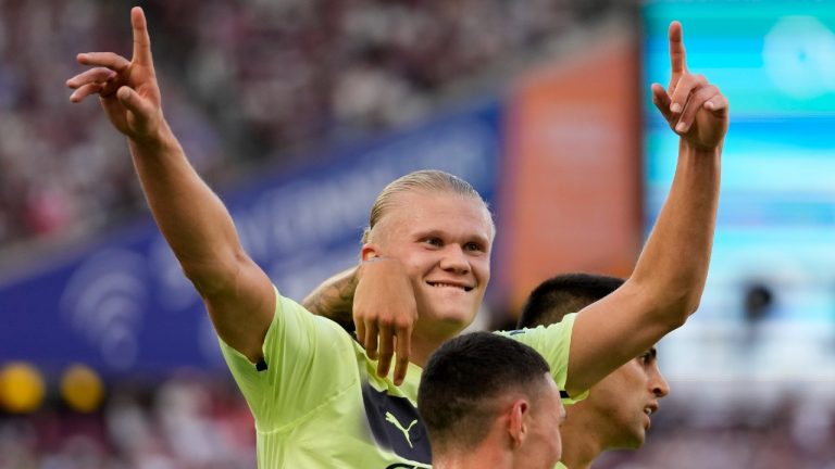 Manchester City's Erling Haaland celebrates after scoring his sides second goal during the English Premier League soccer match between West Ham United and Manchester City at the London Stadium in London, England, Sunday, Aug. 7, 2022. (Frank Augstein/AP)